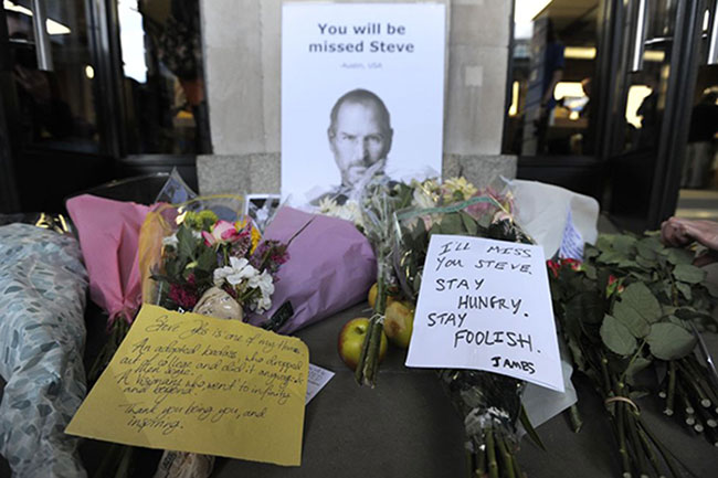 Steve Jobs outside an Apple store in London following his death